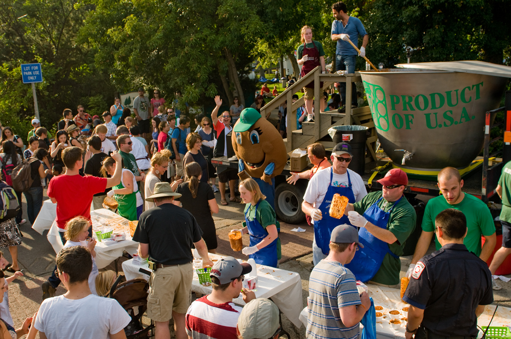 People gather around a giant bowl of chili during the National Lentil Festival in Pullman.