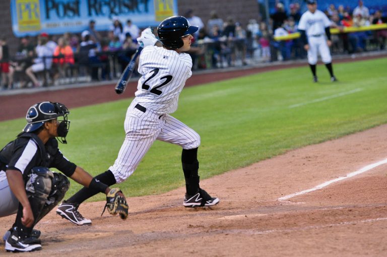 Ryan Dale of the Idaho Falls Chukars hits a ball during a game.