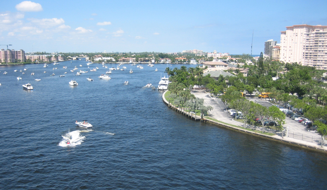 Boats fill Boca Raton Harbor on a sunny day.