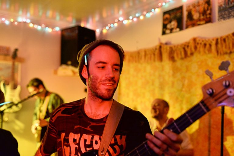 musician playing on stage at the Cat's Cradle