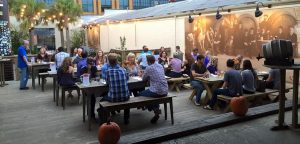 People outside sample beers at Palmetto Brewing in Charleston, SC.
