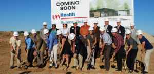 Officials in DeForest break ground for a new health center.