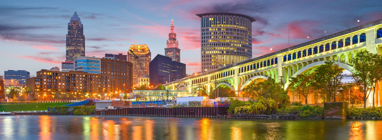 Cleveland, Ohio, USA downtown city skyline on the Cuyahoga River at twilight.