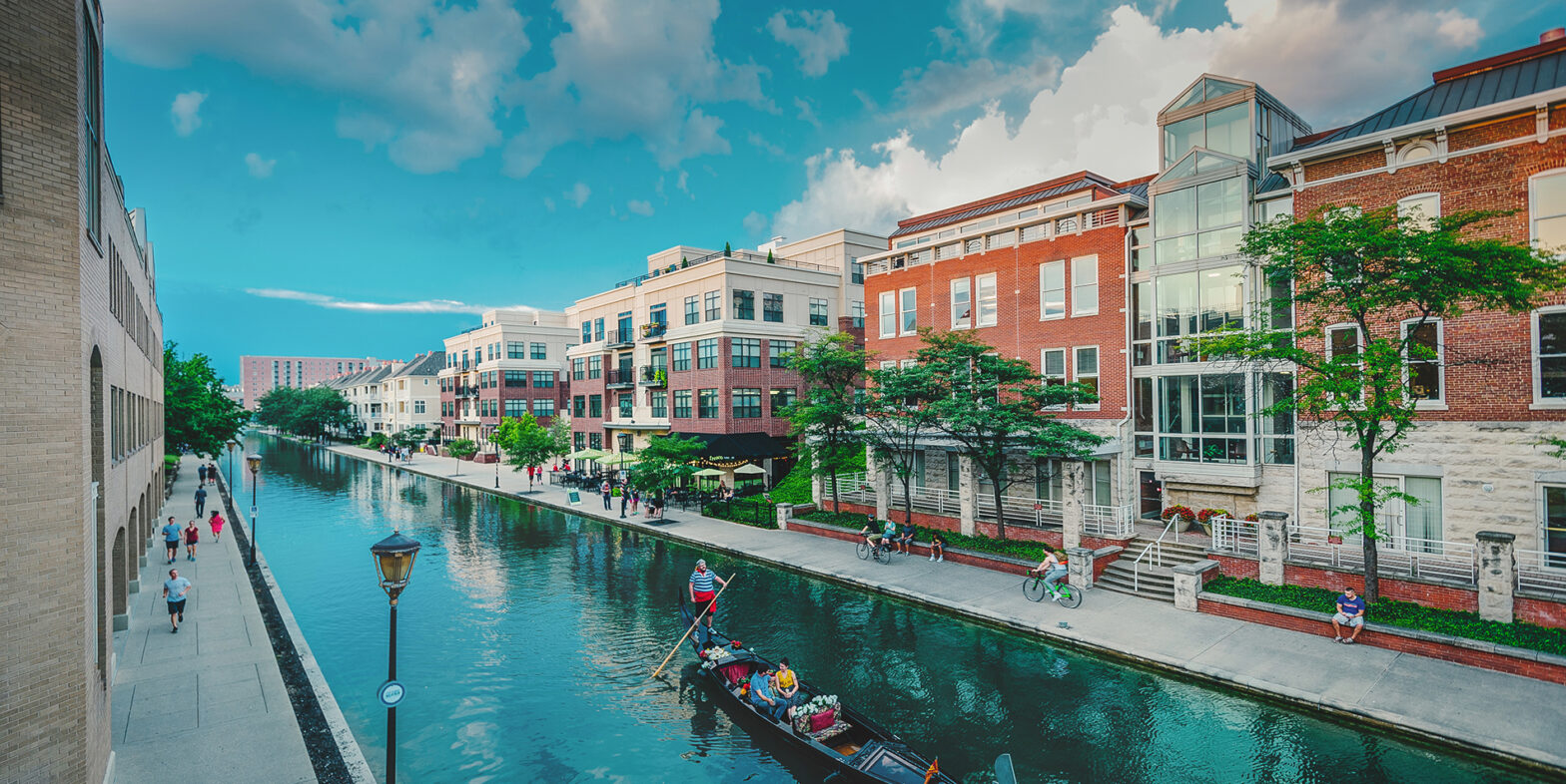 People ride a gondola through the city center of Indianapolis, IN.