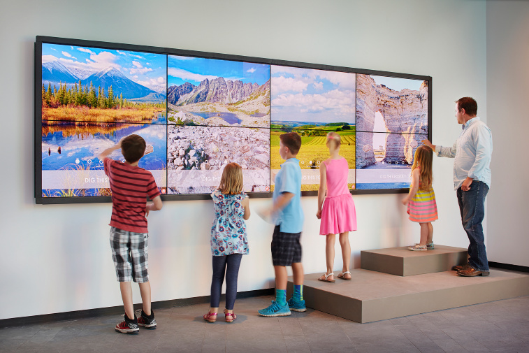 Kids explore the lobby of the Museum at Prairiefire in Overland Park, Kansas.