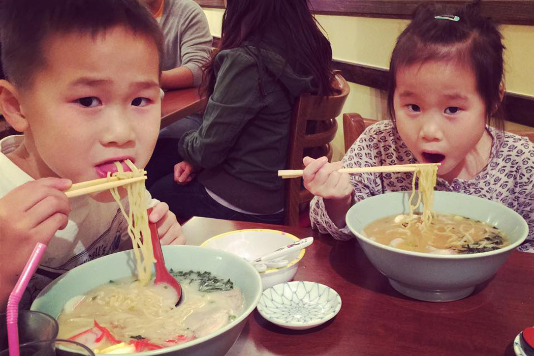 Children eat ramen at Temari Cafe in Rockville, MD