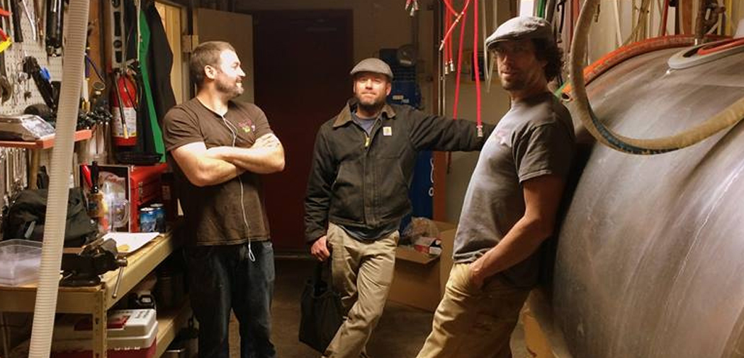 The boys are Bitter Root Brewery in Hamilton, MT take a break from brewing in the cellar.