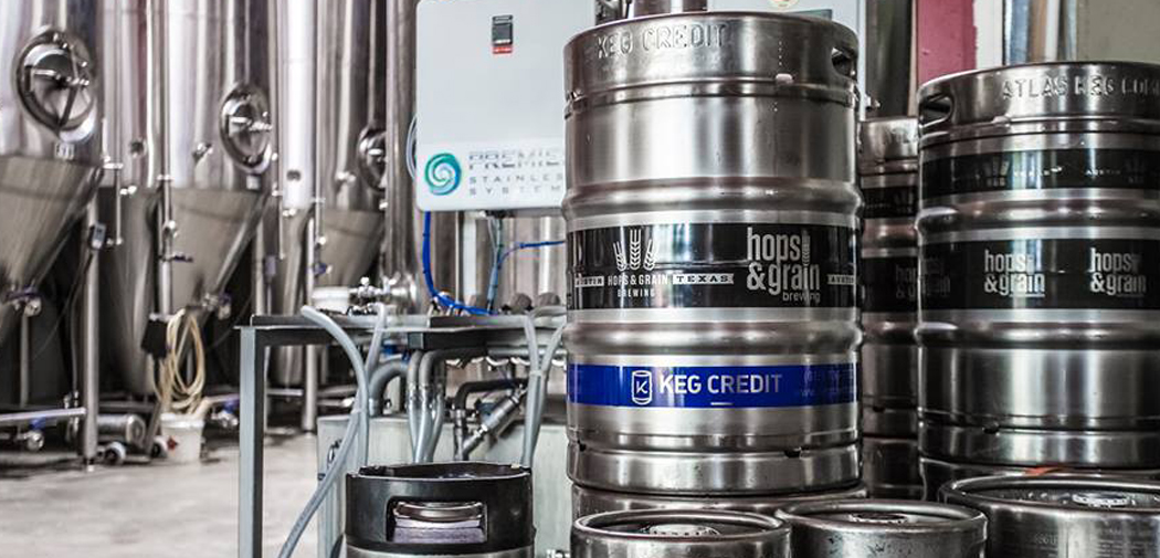 Kegs stacked up in the brewing room at Hops and Grain in Austin, TX.