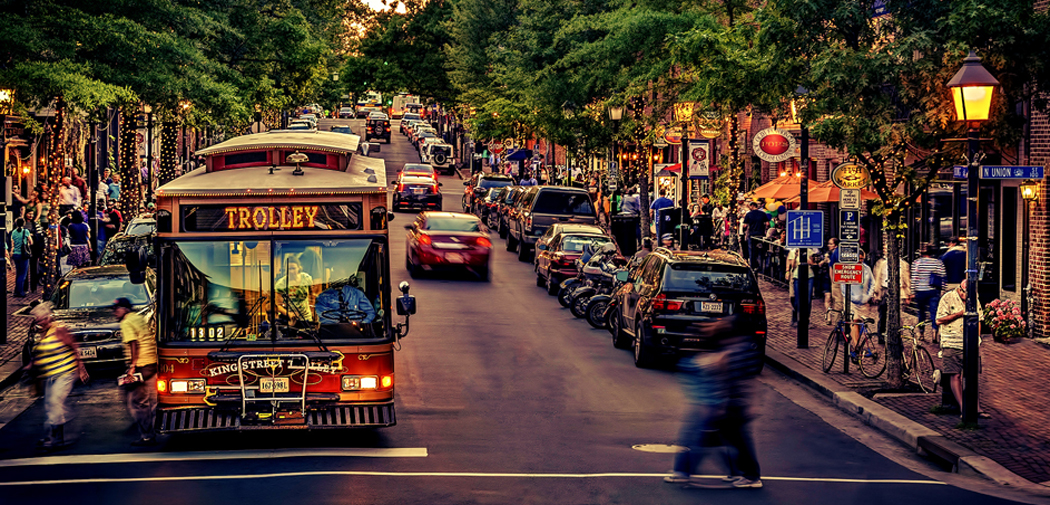 Downtown Alexandria, VA trolley and people walking