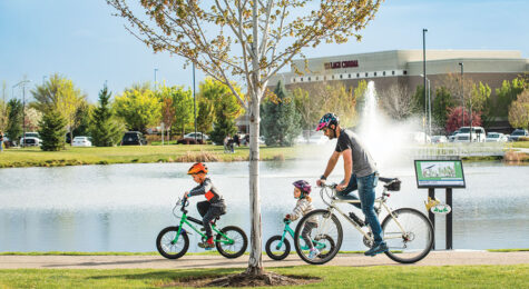 dad riding bikes with kids