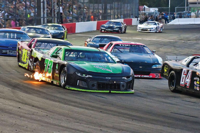 race cars going around a track