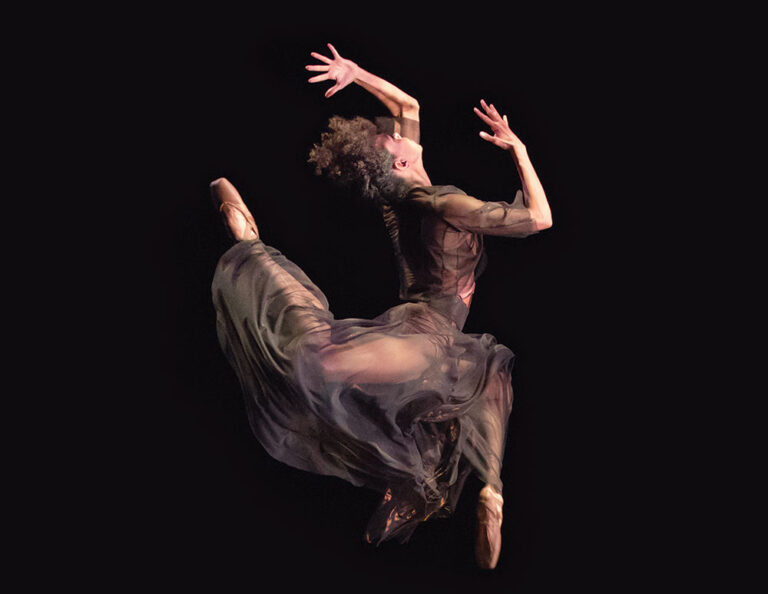 Dancer in mid jump during Music Worcester performance