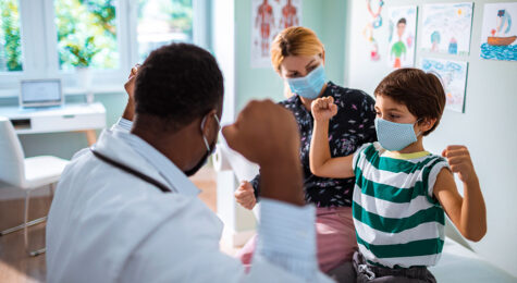 doctor works with young patient