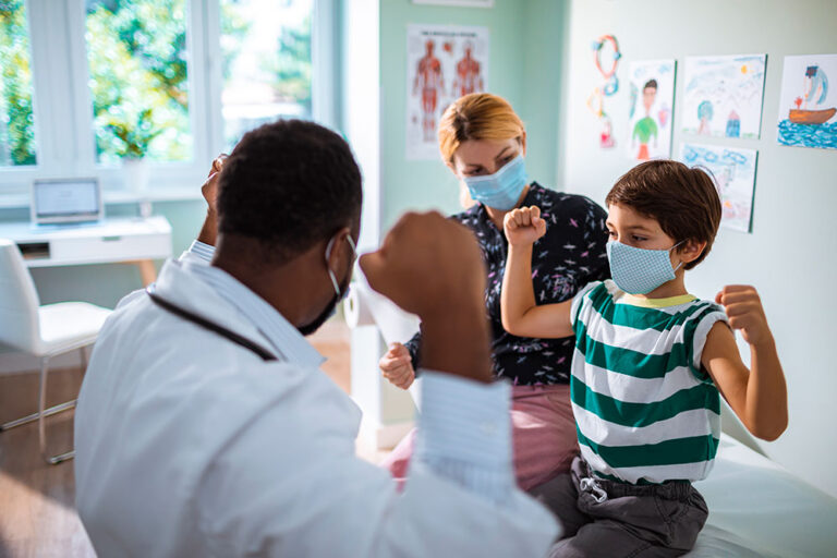 doctor works with young patient
