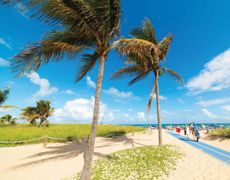 beachgoers heading to beach