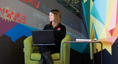 a woman works at The Move in Castle Rock