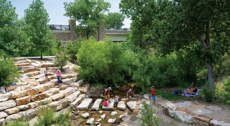 people playing near creek in Castle Rock