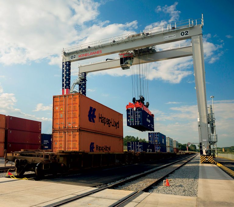 huge machine moves a crate