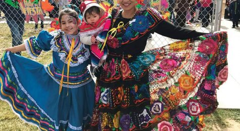 People enjoying fiesta activity at school