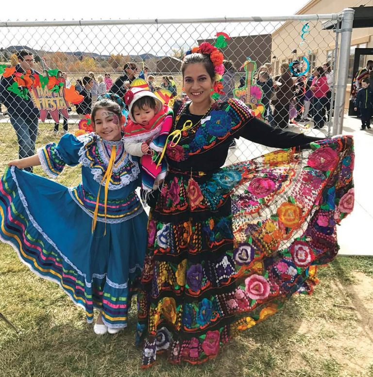 People enjoying fiesta activity at school