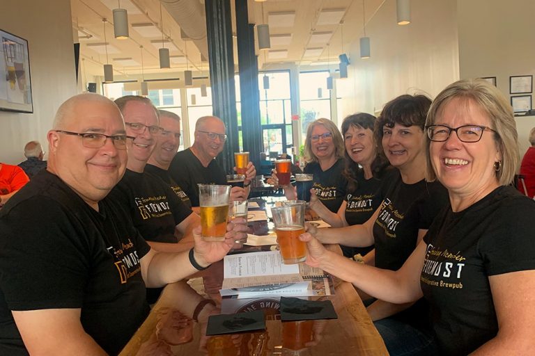 Co-op members drinking beer at Foremost Brewing Co-Op