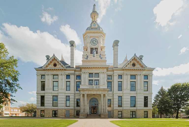 The beautiful Marshall County, Iowa courthouse as seen in 2017. This majestic building was designed by the same firm as the Iowa State Capitol building and was completed in 1886. This building was damaged by a tornado on July 19, 2018 which destroyed the cupola, damaged the roof, and blew out windows.
