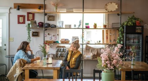 Claire Vock, left, and Sara Bailey talk at a table at The Bridge Cafe in Upland. ©Journal Communications/Nathan Lambrecht