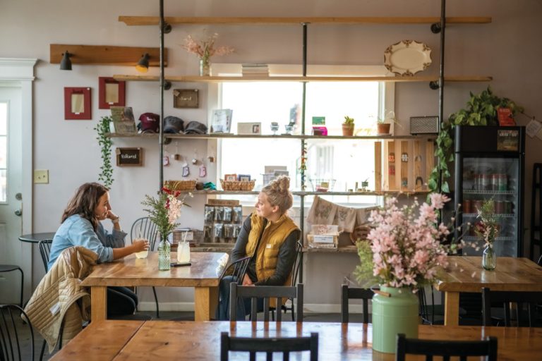 Claire Vock, left, and Sara Bailey talk at a table at The Bridge Cafe in Upland. ©Journal Communications/Nathan Lambrecht