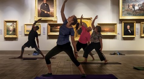 People participate in an evening yoga inside the art gallery at the Museum of Arts and Sciences in Daytona (Greater Daytona Region). ©Journal Communications/Nathan Lambrecht
