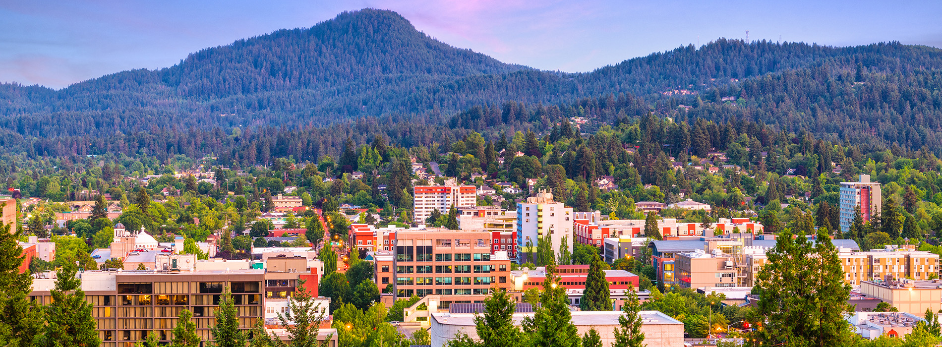 Eugene, Oregon, USA downtown cityscape at dusk.