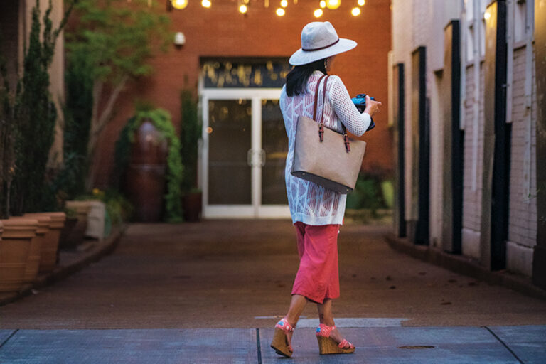 Colorful umbrellas with lights hang above Atlas Alley in the West Village neighborhood of downtown Chattanooga, Tennessee. ©Journal Communications/Jeff Adkins