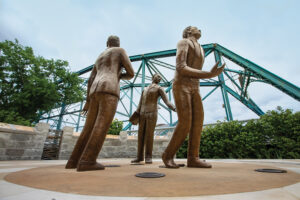 Three life sized bronze figures by artist Jerome Meadows, are part of the Ed Johnson Memorial Project next to the Walnut Street Bridge in downtown Chattanooga, Tennessee. ©Journal Communications/Jeff Adkins