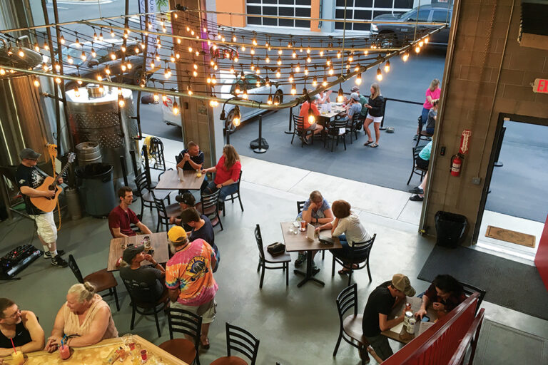 Castle Rock, CO: Aerial shot of people gathered at Honnibrook Craft Meadery
