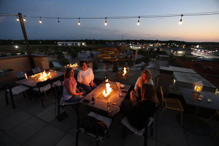 Visitors enjoy the sunset at Gracie's Rooftop Bar at the Rigby's Entertainment Complex in Warner Robins, Georgia. ©Journal Communications/Jeff Adkins