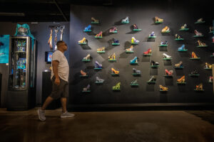 Glass shoes are on display in Rob Stern's Stern's Stilettos Exhibition at the Wiener Museum of Decorative in Dania Beach, Florida. Dania Beach is part of the Greater Fort Lauderdale area.