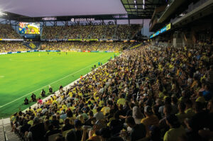 Fans cheer on Nashville SC against the Seattle Sounders FC at Geodis Park in Nashville, Tennessee.