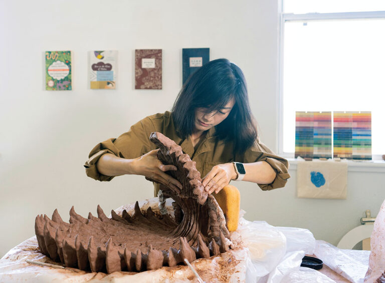 Sculptor Wen Liu (RAiR 2022-23) works in a studio provided by the Roswell Artist-in-Residence Program in Roswell, NM.