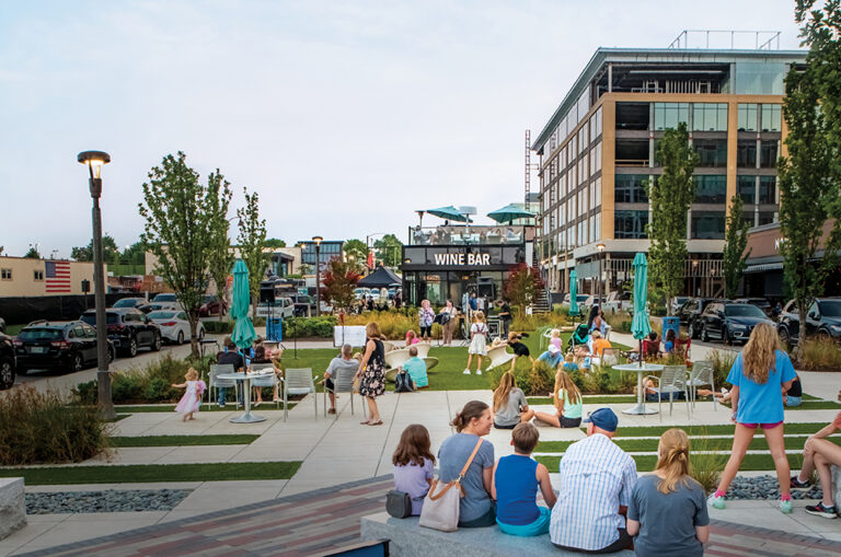 People enjoy an evening on the lawn at McEwen Northside in Franklin. Franklin is located in Williamson County.