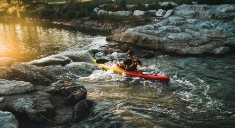 A kayaker ventures down Kearney Whitewater Trail in Kearney, NE.