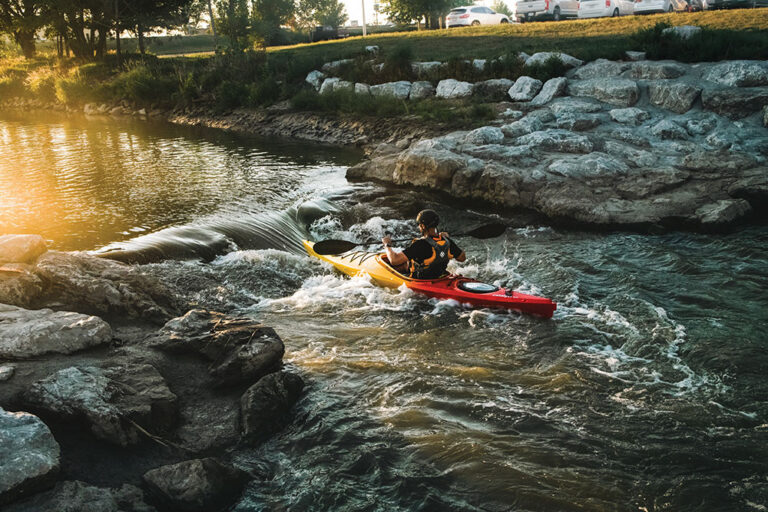A kayaker ventures down Kearney Whitewater Trail in Kearney, NE.