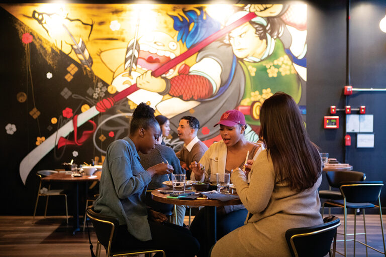 Tahkeya Blake, left, Veronica Yanes and Ariana Harris dine at Chashu Ramen + Izankaya in Worcester, MA.
