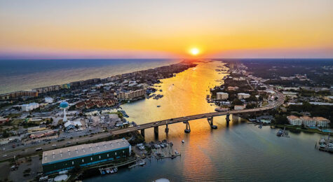 The sun sets over the pristine coastline of Okaloosa County, Florida.