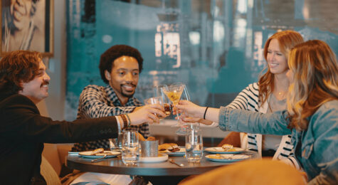 People enjoy cocktails at a spot in Uptown Columbus, GA.