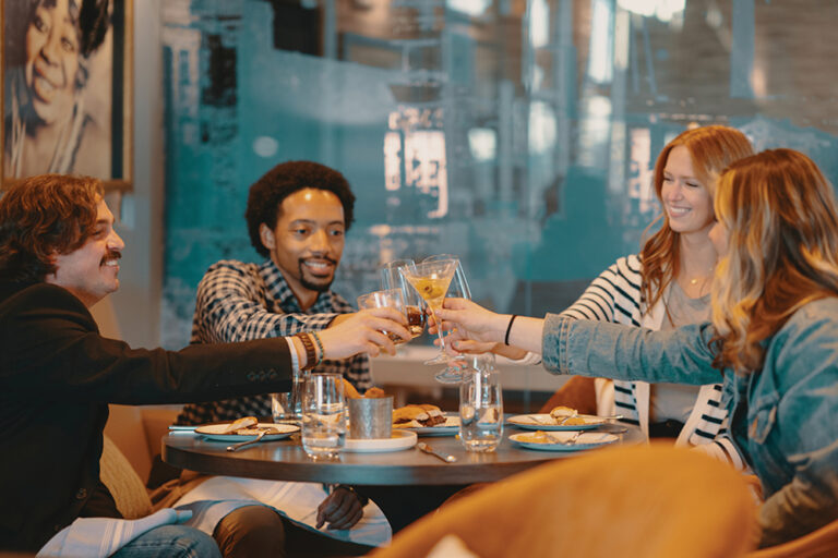 People enjoy cocktails at a spot in Uptown Columbus, GA.