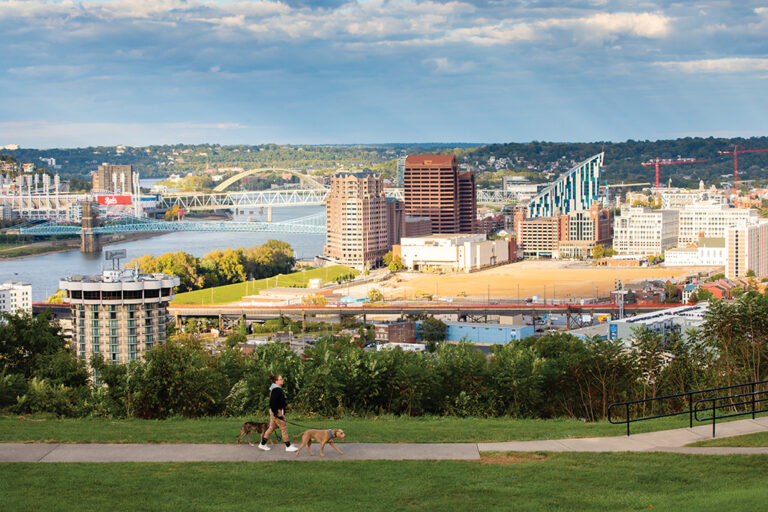 People watch the sunset over Covington and the Ohio River from Devou Park in Covington. Covington is part of the Northern Kentucky Region.