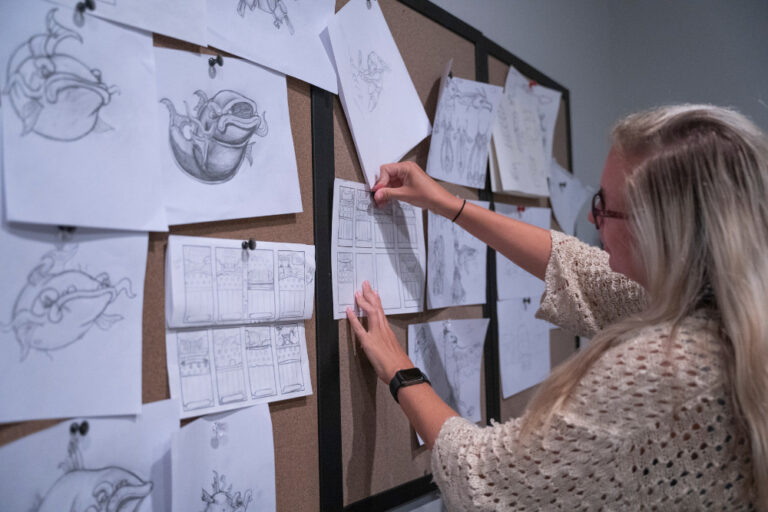 Woman works on mapping out a game for Grover Gaming in Greenville, NC. Greenville tech is an emerging industry in the city.