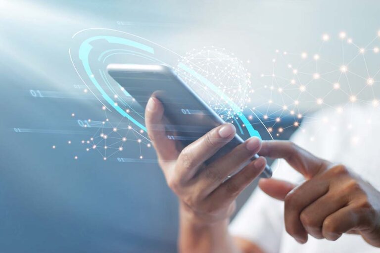 Man using mobile smart phone with global network connection to illustrate digital divide.