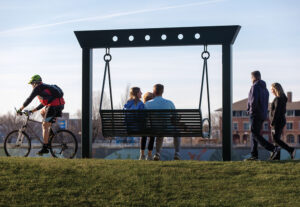 A family enjoys the spring weather at the RiverScape MetroPark along the Great Miami River in Dayton, OH.