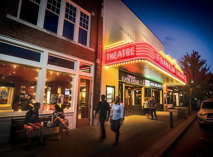 The Franklin Theatre lights up at dusk in downtown Franklin, TN. Franklin's charming downtown, Civil War history and family-friendly reputation make it one of the best places to live in the U.S.