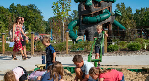 Children play in a sandbox at one of Rochester Hills, MI's many parks. Rochester Hills, a suburb of Detroit, is one of the best places to live in the US in 2023.